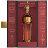 Bottle of Makers Mark Centennial Reserve whiskey in a decorative box with gold accents.
