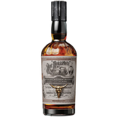 Bottle of whiskey with a label on a white background