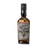 Bottle of Doc Holliday whiskey with a detailed label on a black background