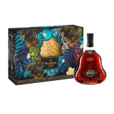 Hennessy XO cognac bottle with decorative box on a white background