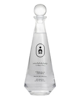Humano tequila bottle on a white background