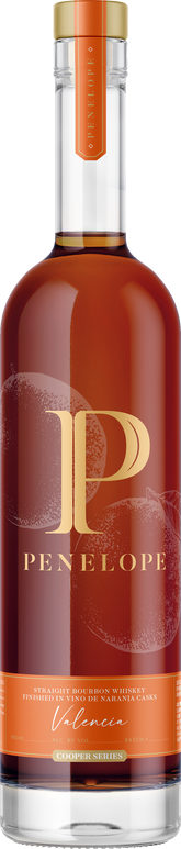 Bottle of Penelope with a gold cap and label.