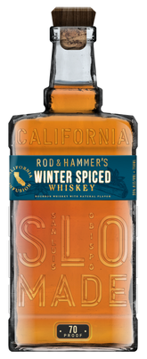 Bottle of Rod & Hammer's Winter Spiced Whiskey with a blue label on a white background