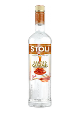 Stoli Salted Caramel flavored vodka bottle on a white background