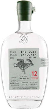 A clear glass bottle of Tequila by Seriously Garza, featuring a dark green cap and a light gray-green label with a black rooster illustration and red text indicating 12 years of age. The brand 'Seriously Garza' is embossed at the bottom of the bottle.