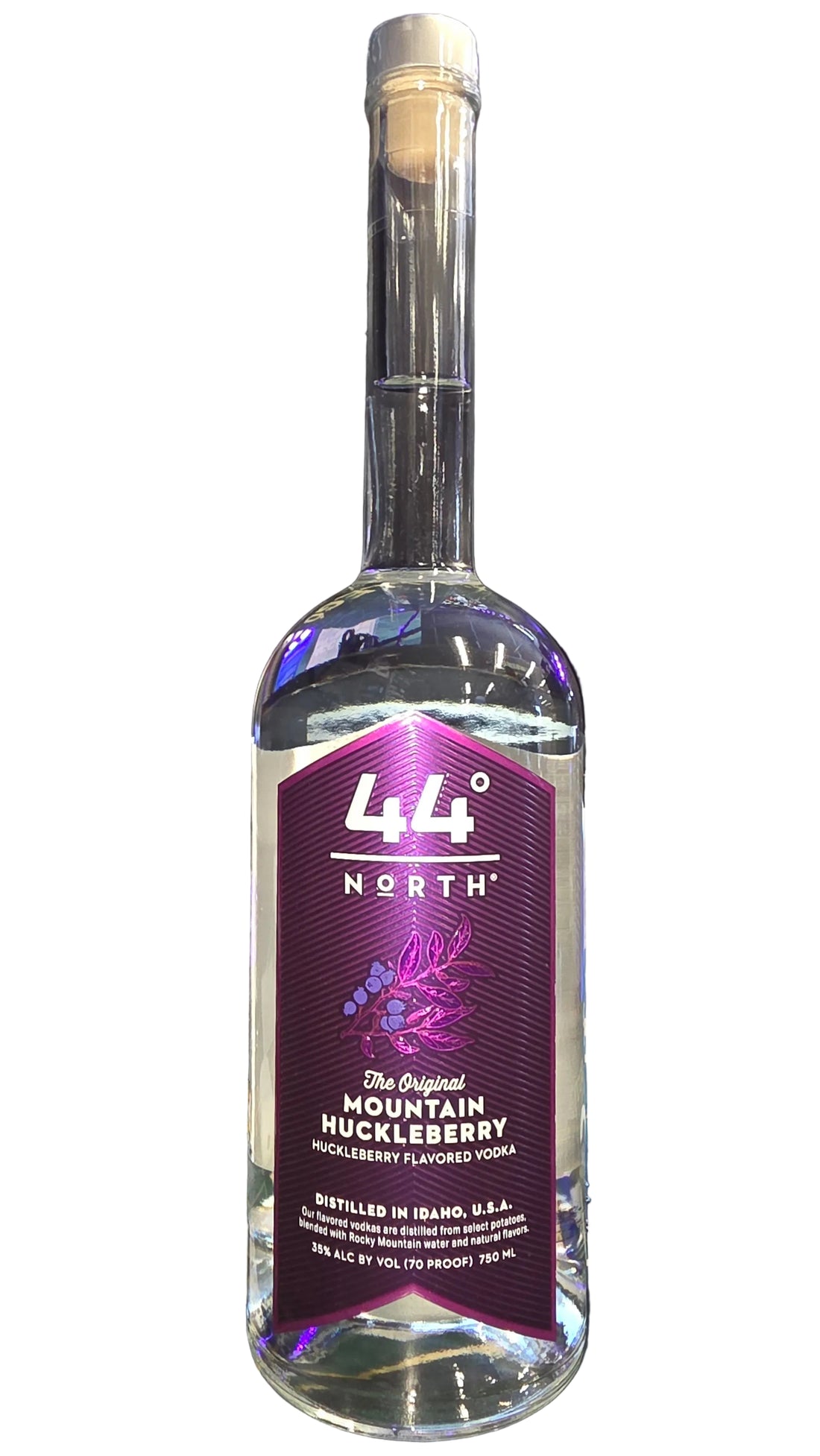 Bottle of 44 North mountain huckleberry liqueur on a dark background