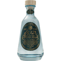Bottle of Agua Mágica on a white background