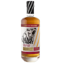 Bottle of Bear Fight Orchard and Vine whiskey with a white label on a white background