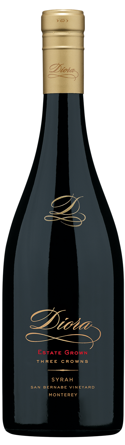 A bottle of Dioha Estate Grown Three Crowns Syrah from Monterey, San Ramejo Vineyard, featuring a dark glass bottle with a gold foil capsule and elegant gold and red lettering on the label.