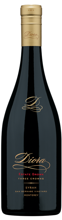 A bottle of Dioha Estate Grown Three Crowns Syrah from Monterey, San Ramejo Vineyard, featuring a dark glass bottle with a gold foil capsule and elegant gold and red lettering on the label.