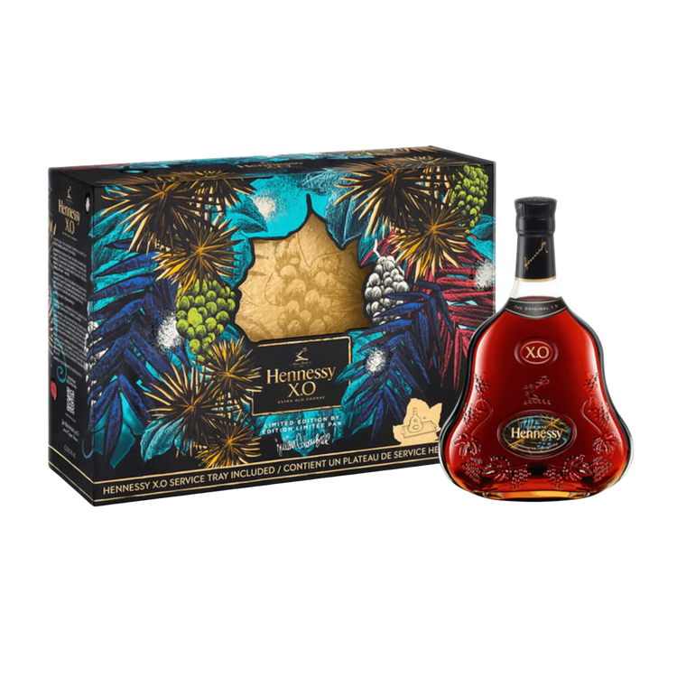 Hennessy XO cognac bottle with decorative box on a white background
