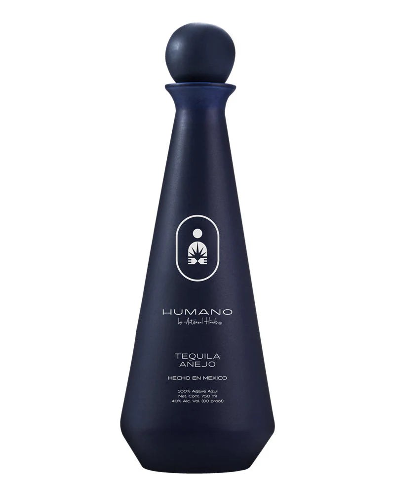 Navy blue tequila bottle with 'Humano' branding on a white background