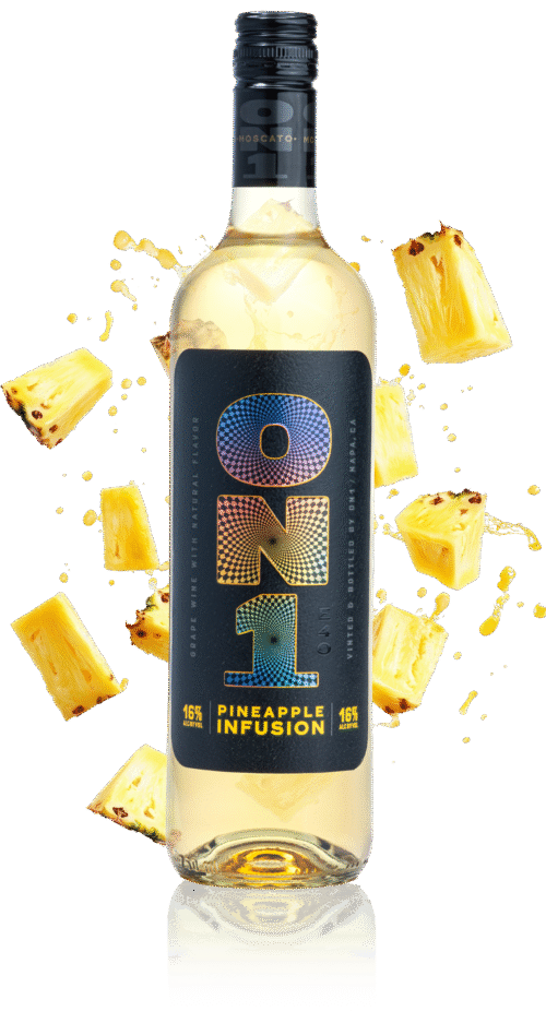 Bottle of ON1 Pineapple Infusion with pineapple pieces on a beige background