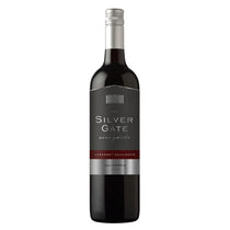 A bottle of Silver Gate Cabernet Sauvignon wine on a plain white background. The bottle is dark glass with a silver screw cap and a dark gray label featuring silver text and a red horizontal accent band.