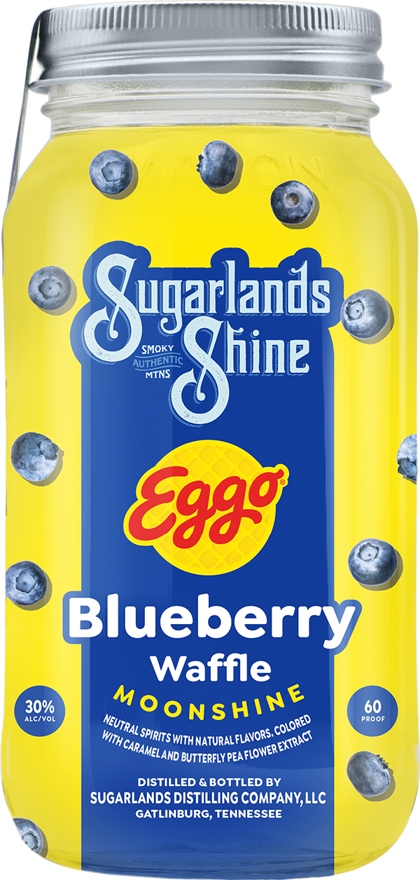 Mason jar of Sugarlands Shine Eggo Blueberry Waffle Moonshine with blueberries on a yellow background