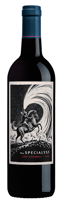 A bottle of red wine with a dark label featuring a black and white illustration of a rider on a horse in front of a swirling wave, with the text 'The SPECIALIST' and 'LODI ZINFANEL 2019' on the label.