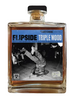 Bottle of Flipside Triple Wood with a black and white photo of a handstand on the label.