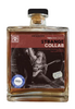 Bottle of Three Chords Strange Collab whiskey with a label featuring a graphic design.