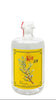 Bottle of Kuh Gin with a yellow label on a white background