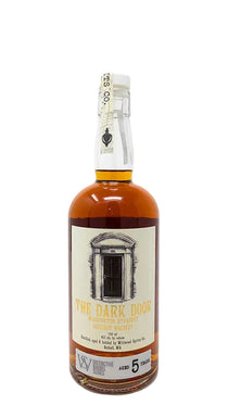 Bottle of whiskey with a label on a white background