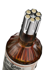 Bottle of Wyatt Earp whiskey with a unique bottle cap design on a black background